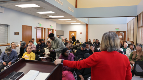 Rocio Casanova talking to community members